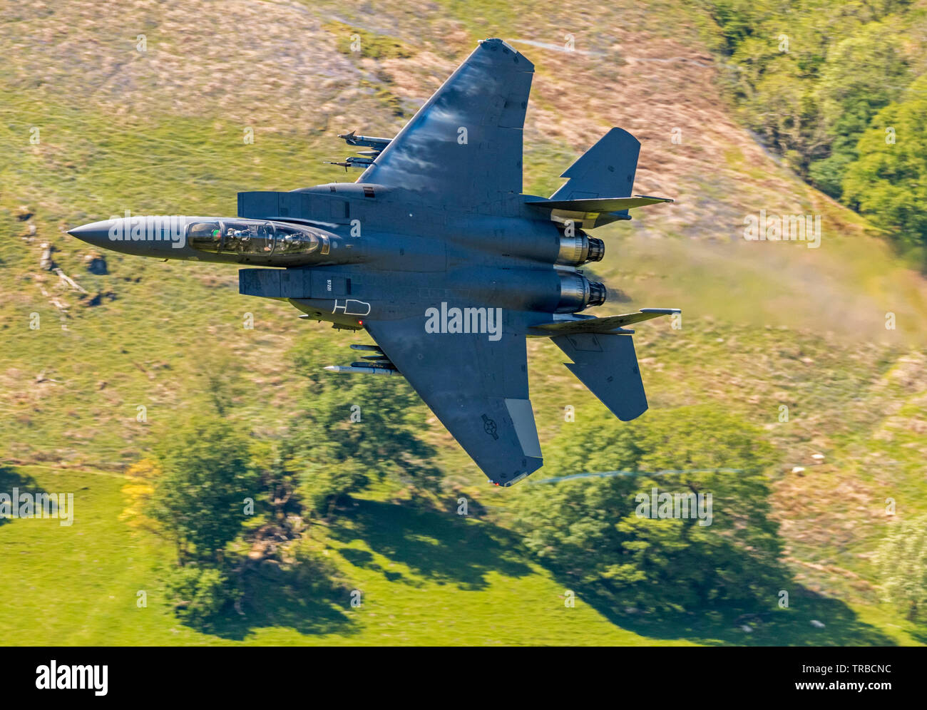 Il USAF F-15E Strike Eagle dal 48th/FW a RAF Lakenheath volare basso livello nel Galles Foto Stock