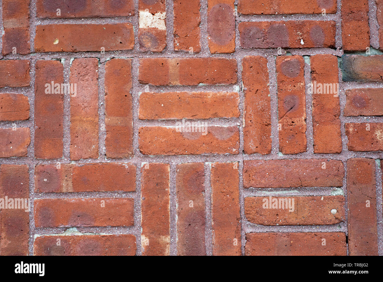 Close up Modello a tratteggio incrociato e parete di mattoni Foto Stock