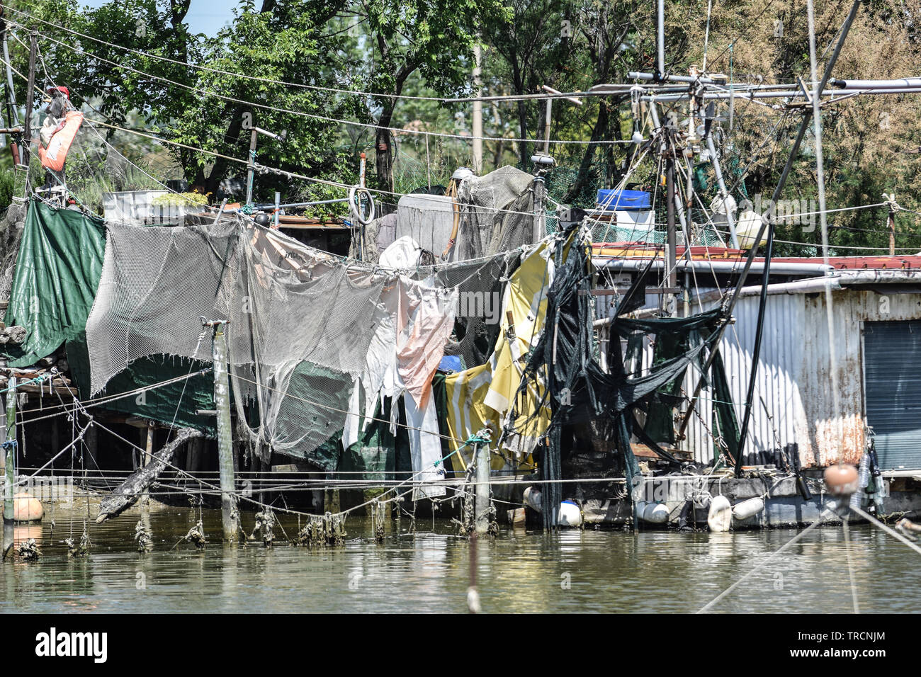 Pesca sul fiume, Delta del Po, Comacchio, Emilia Romagna, Italia. Giugno 2019 Foto Stock