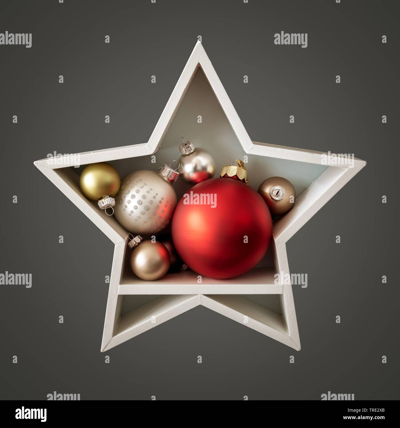 Decorazione di Natale stella bianca con alcune palline di vetro interno Foto Stock