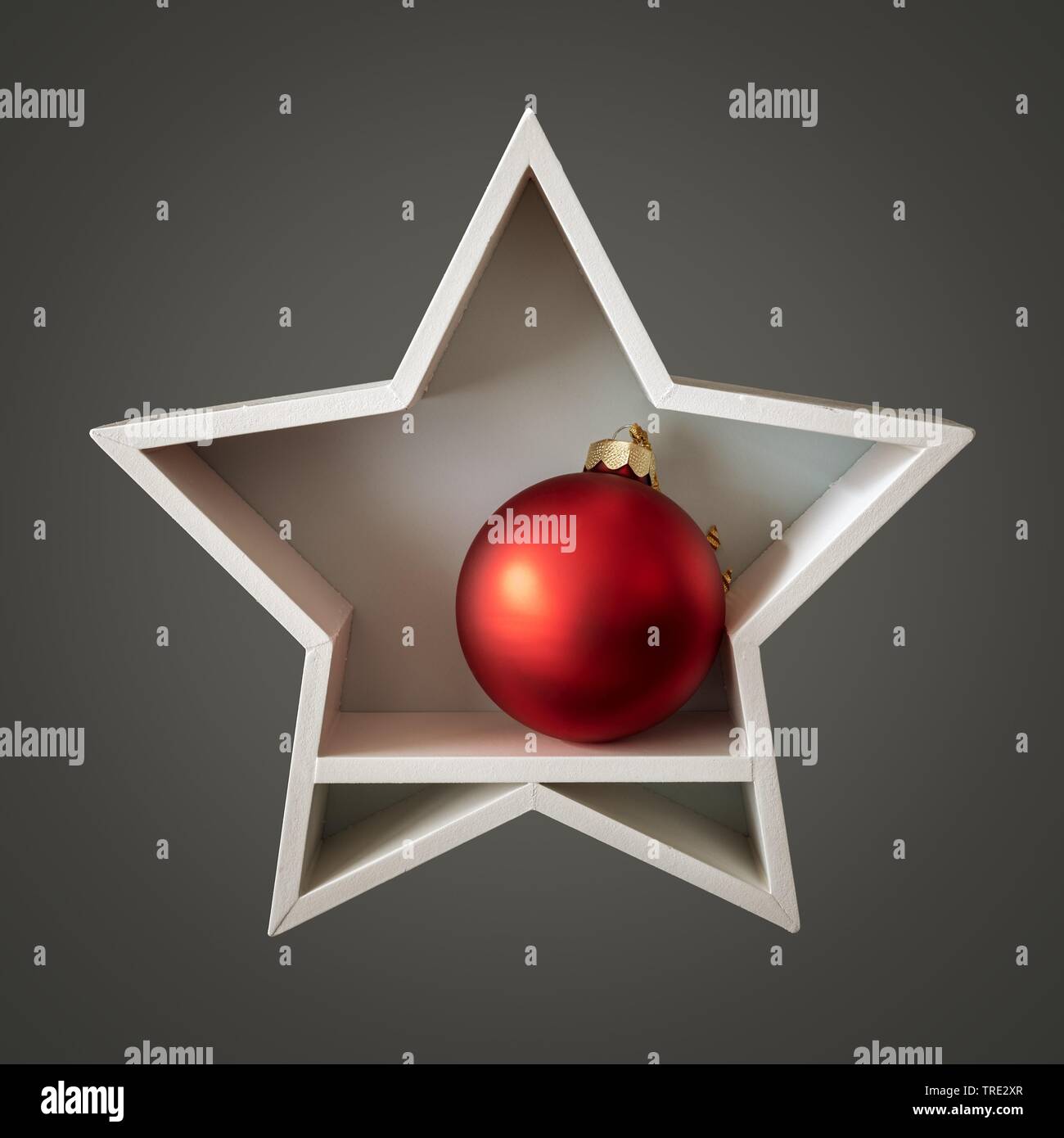 Decorazione di Natale stella bianca con alcune palline di vetro interno Foto Stock