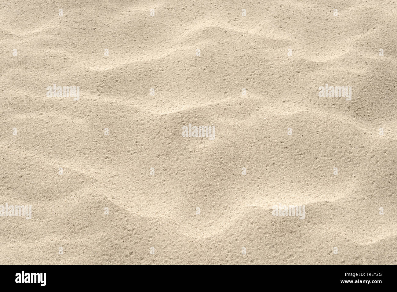 Spiaggia di sabbia la texture. Estate sfondo con un frammento di resort sul mare in spiaggia. Astrazione in natura Foto Stock