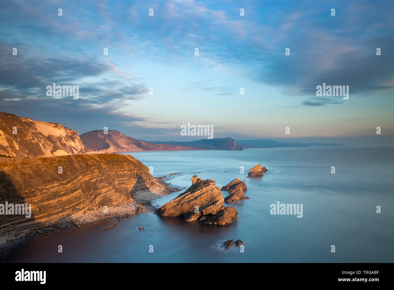 Worbarrow Bay da Mupe Bay al crepuscolo, Jurassic Coast, Inghilterra Foto Stock