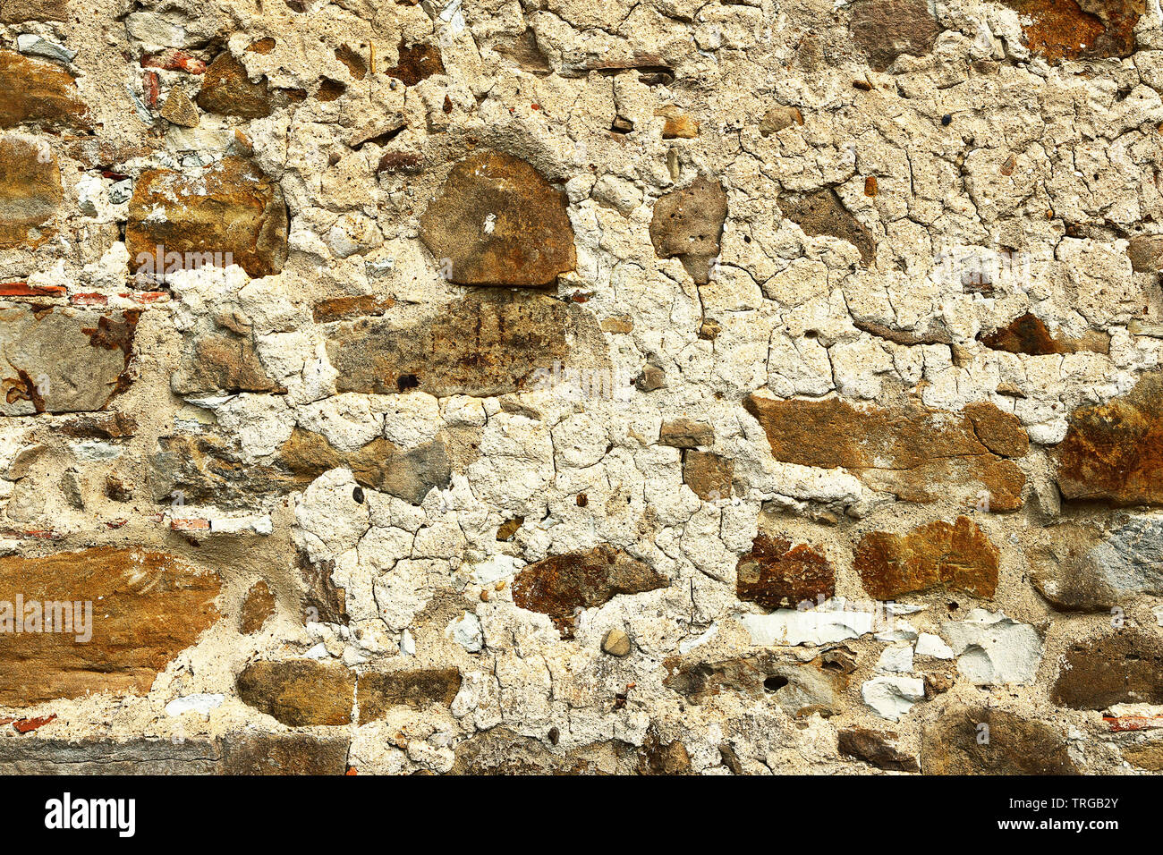 Vecchio weathered muro di pietra, di consistenza per la tua progettazione architettonica Foto Stock