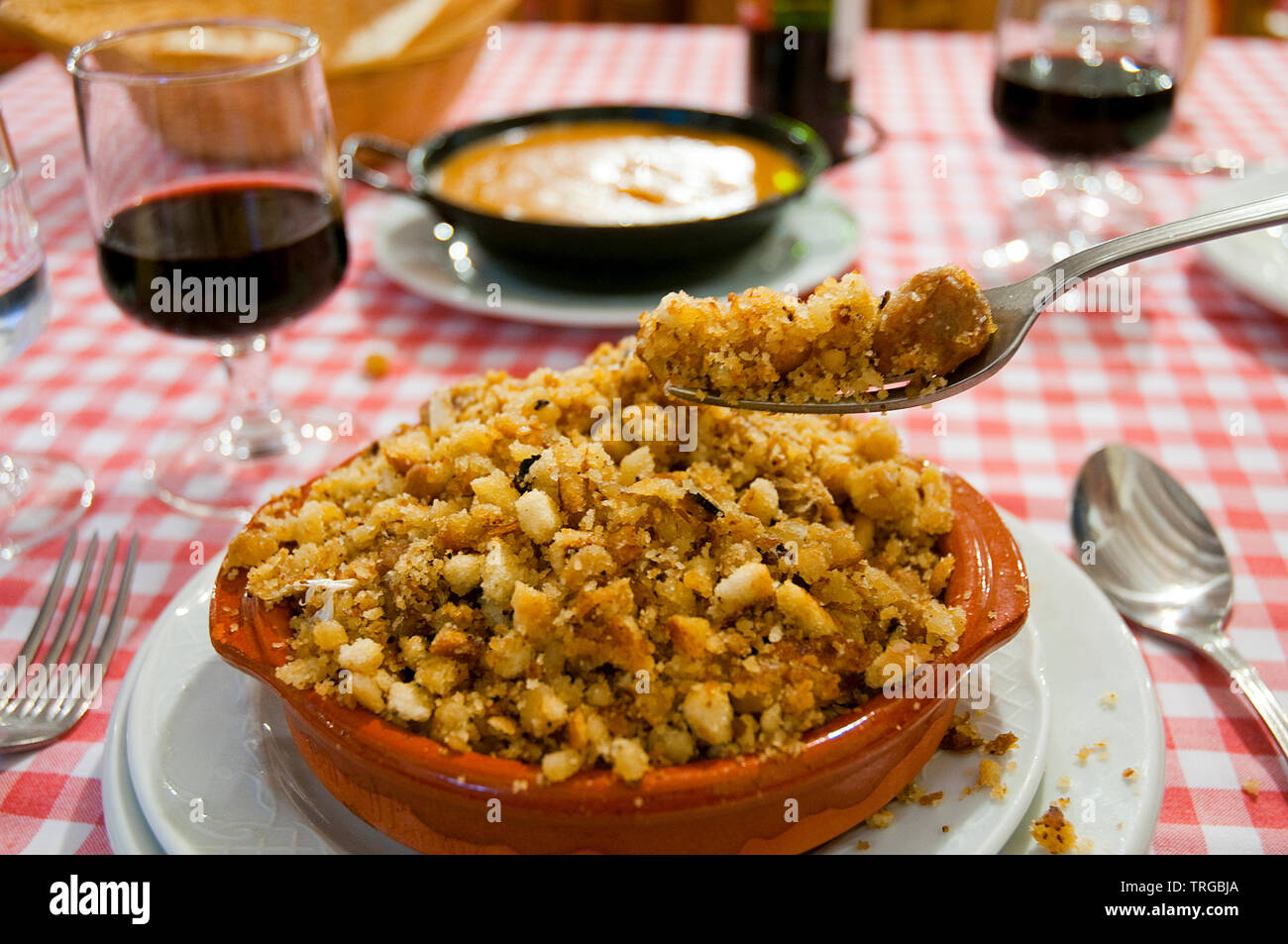 Migas di servire. La Mancha, in Spagna. Foto Stock