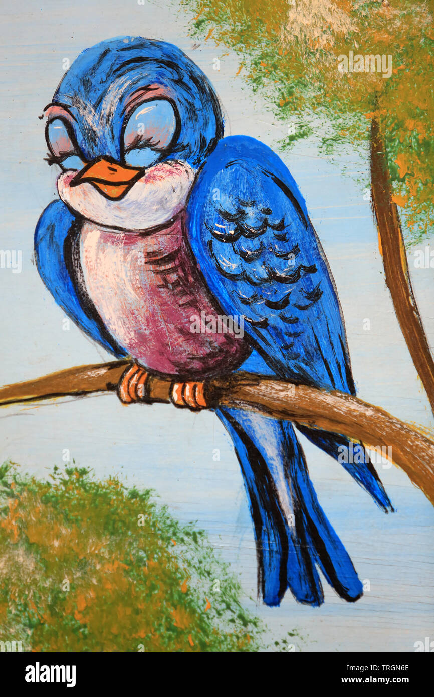 Oiseau bleu sur une branche d'arbre. Foto Stock