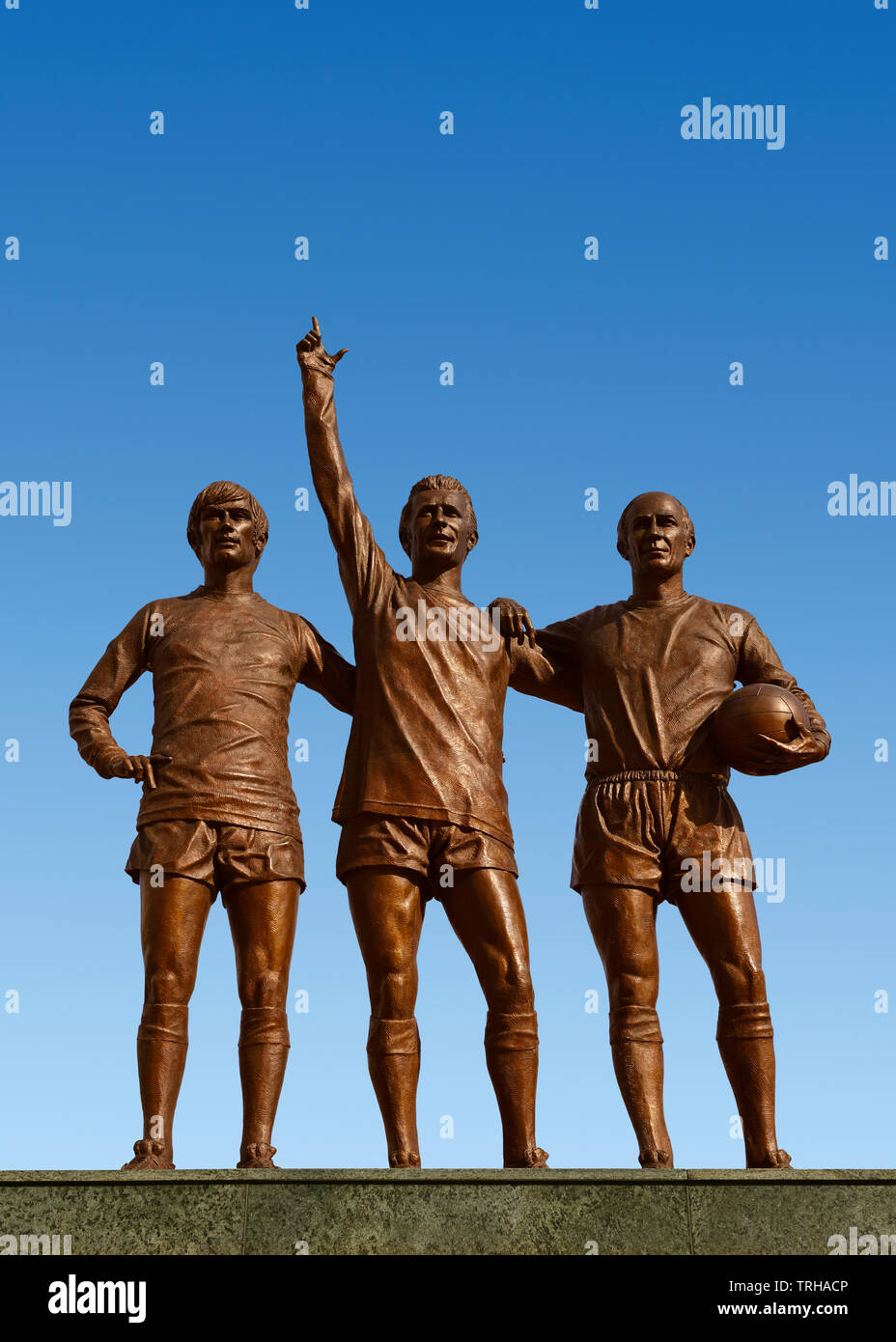 Santa Trinità statua fuori lo stadio del Manchester United, Old Trafford, Manchester, Regno Unito Foto Stock