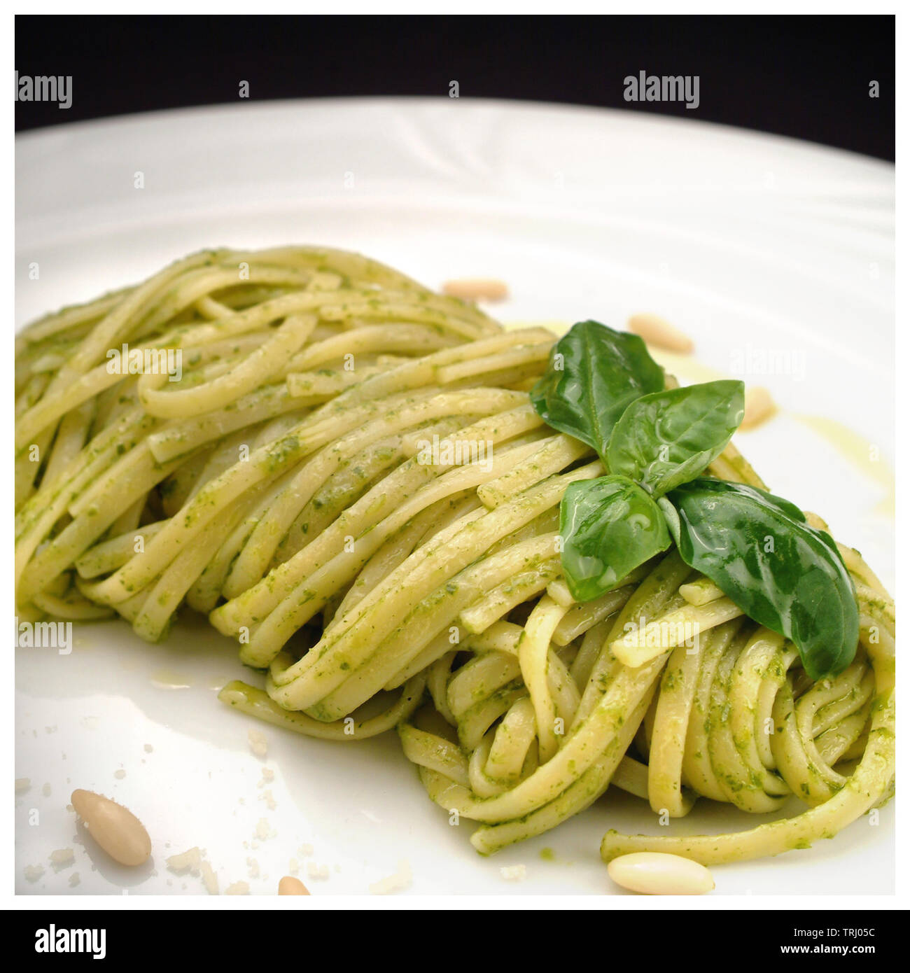 Ricette di cucina italiana, la pasta tradizionale con pesto alla genovese salsa Foto Stock