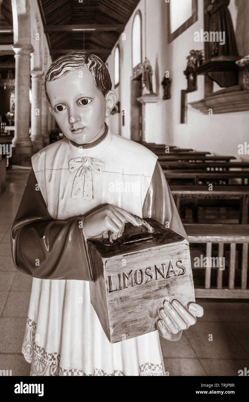 Limosnas (la carità, l'Elemosina, donazioni) casella nella Chiesa in Spagna. Foto Stock