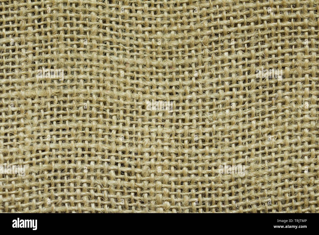 Grunge Sfondo della texture tessili. Dark naturale biancheria ruvida consistenza per lo sfondo. Tessuto di lino a trama bag.saccheggi sullo sfondo Foto Stock