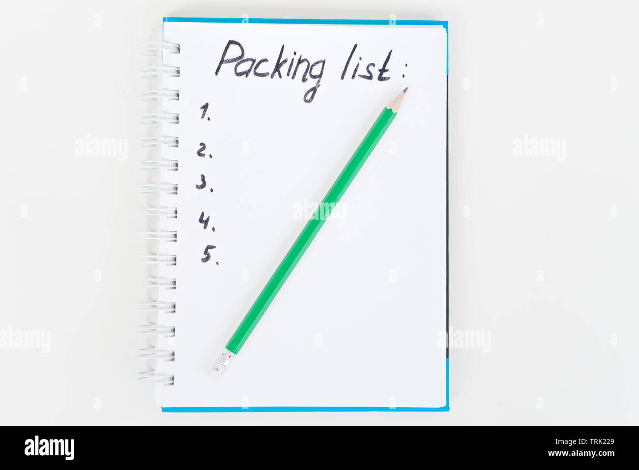 Lista di imballaggio in bianco per notebook. Vista superiore Foto Stock