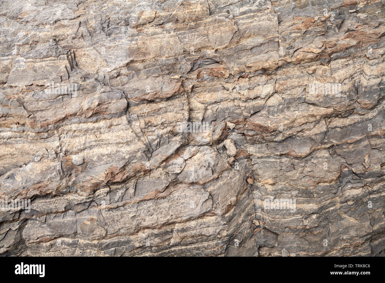 Marrone ruvido muro di pietra, roccia naturale superficie foto di sfondo texture Foto Stock