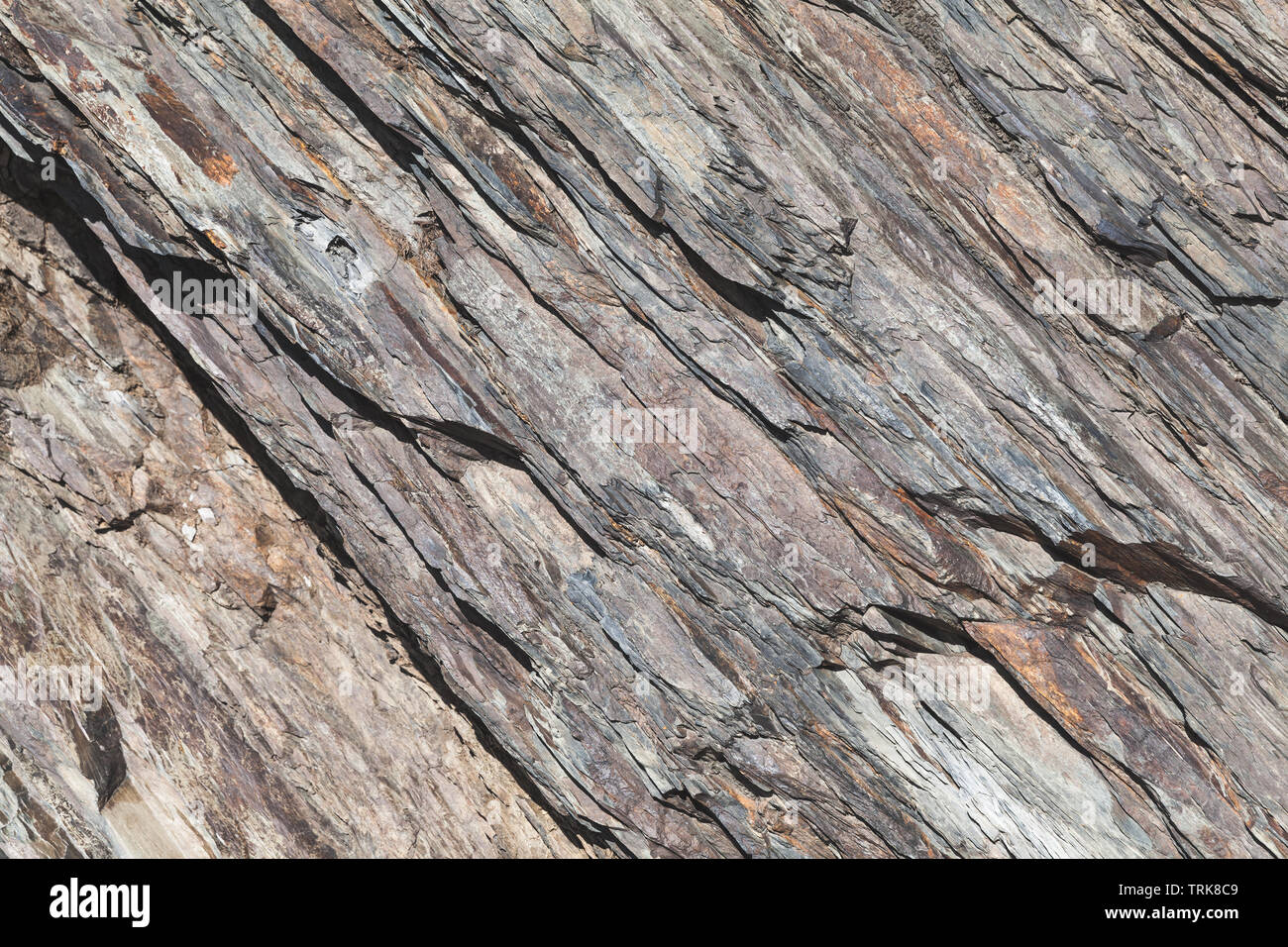 Ruvida a strati di roccia naturale superficie, foto di sfondo texture Foto Stock