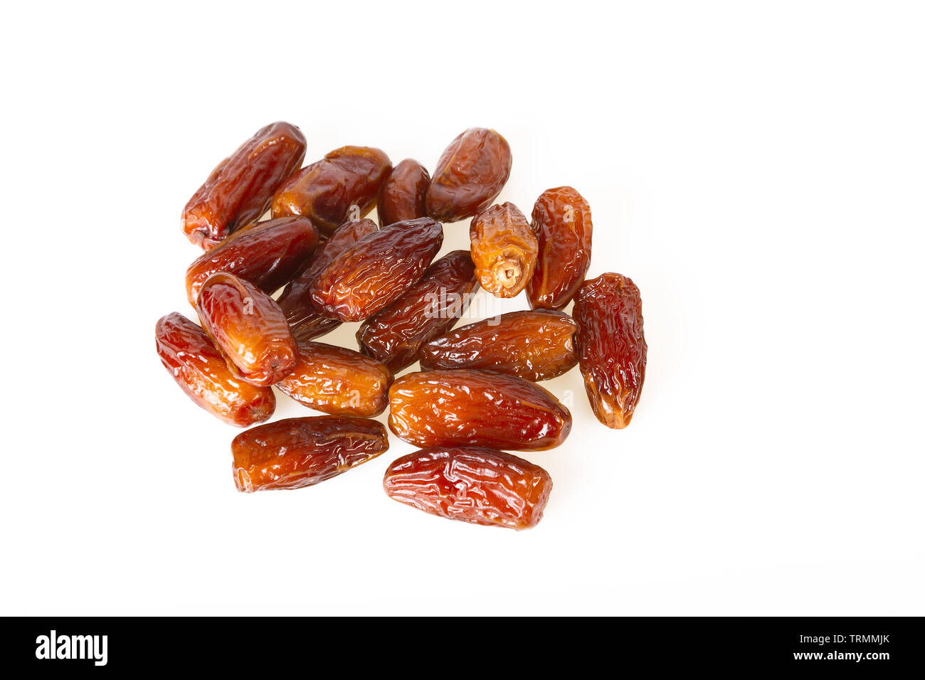 Date frutti dolci secchi isolato su bianco overhead shot Foto Stock