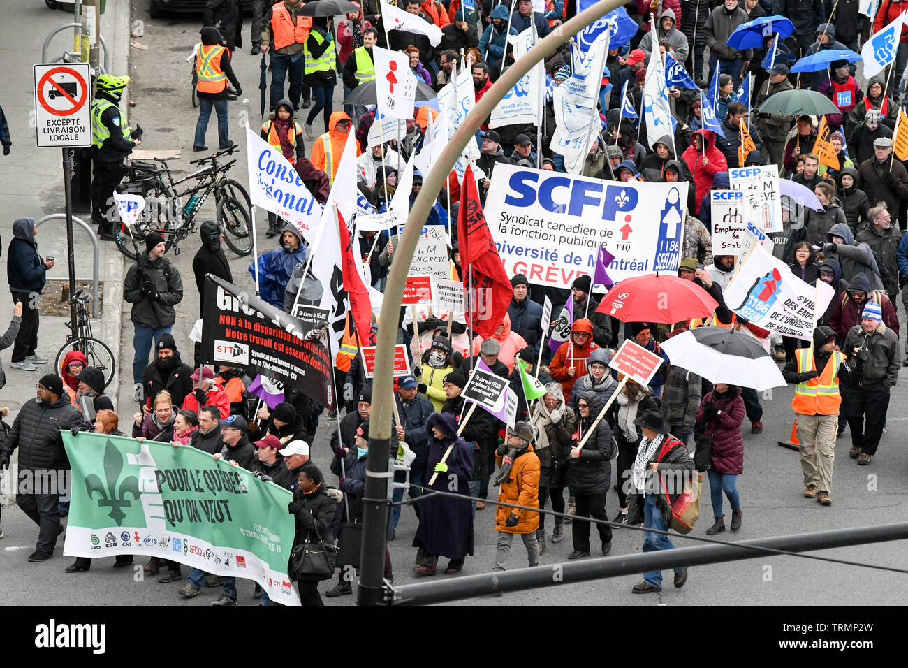 Il giorno della festa del lavoro 2019, colpendo l'Unione operai manifestano per le strade di Montreal Foto Stock
