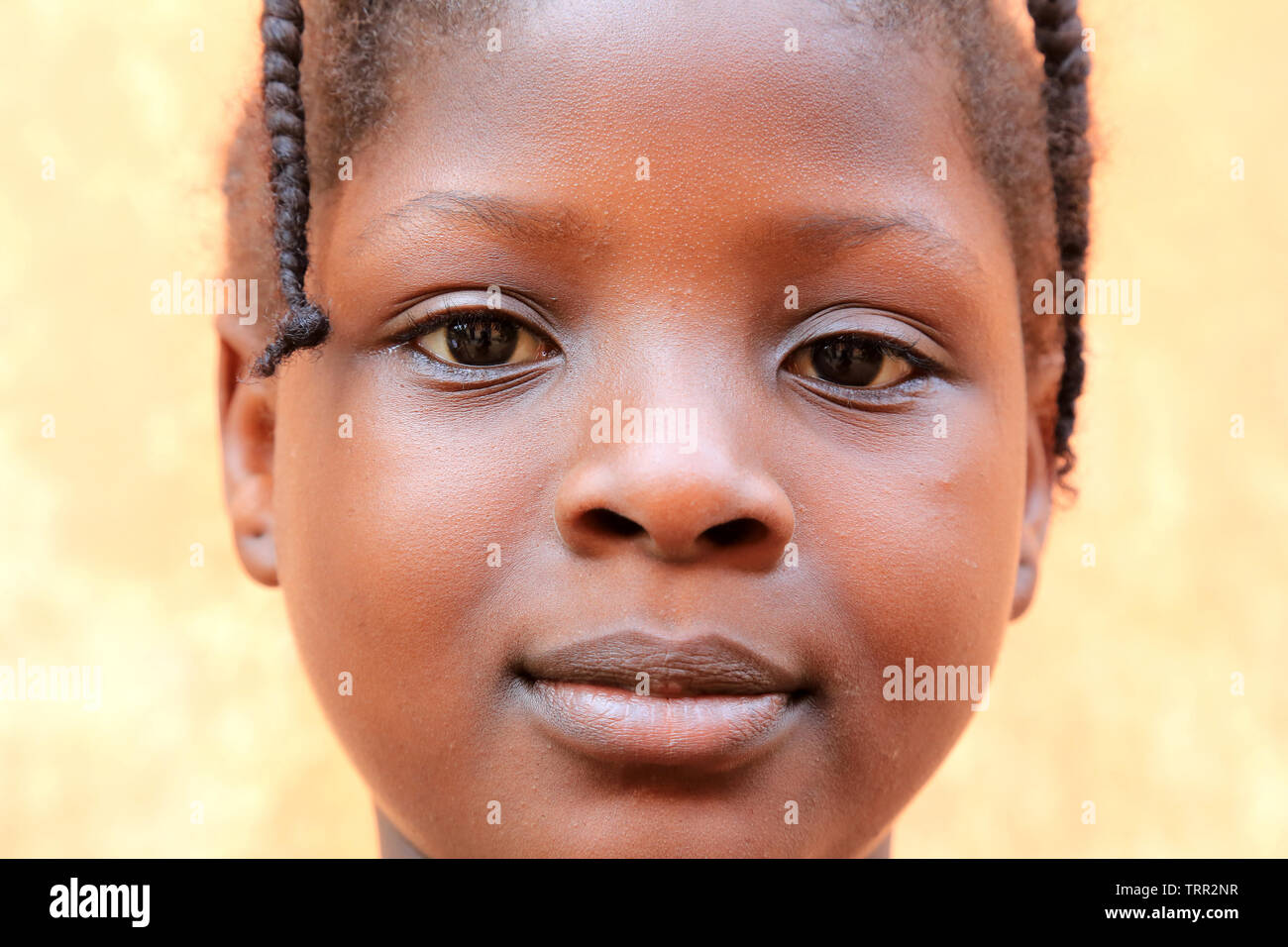 Ritratto d'une petite fille togolaise. La convenzione di Lomé. Il Togo. Afrique de l'Ouest. Foto Stock