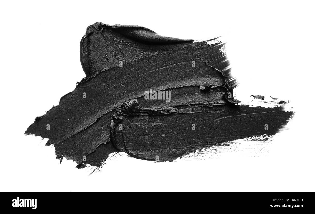 La texture di nero schiacciato eyeliner o vernice a base acrilica nera isolati su sfondo bianco Foto Stock
