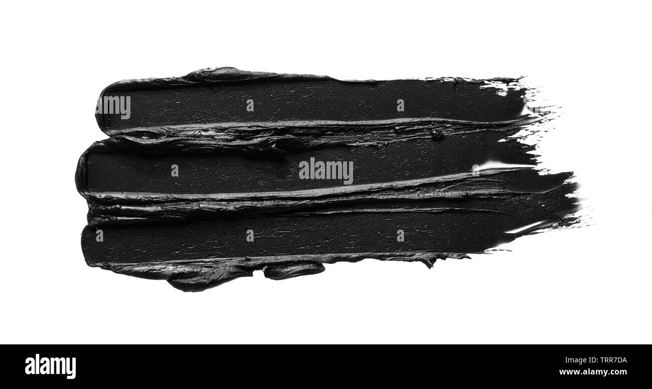 La texture di nero schiacciato eyeliner o vernice a base acrilica nera isolati su sfondo bianco Foto Stock
