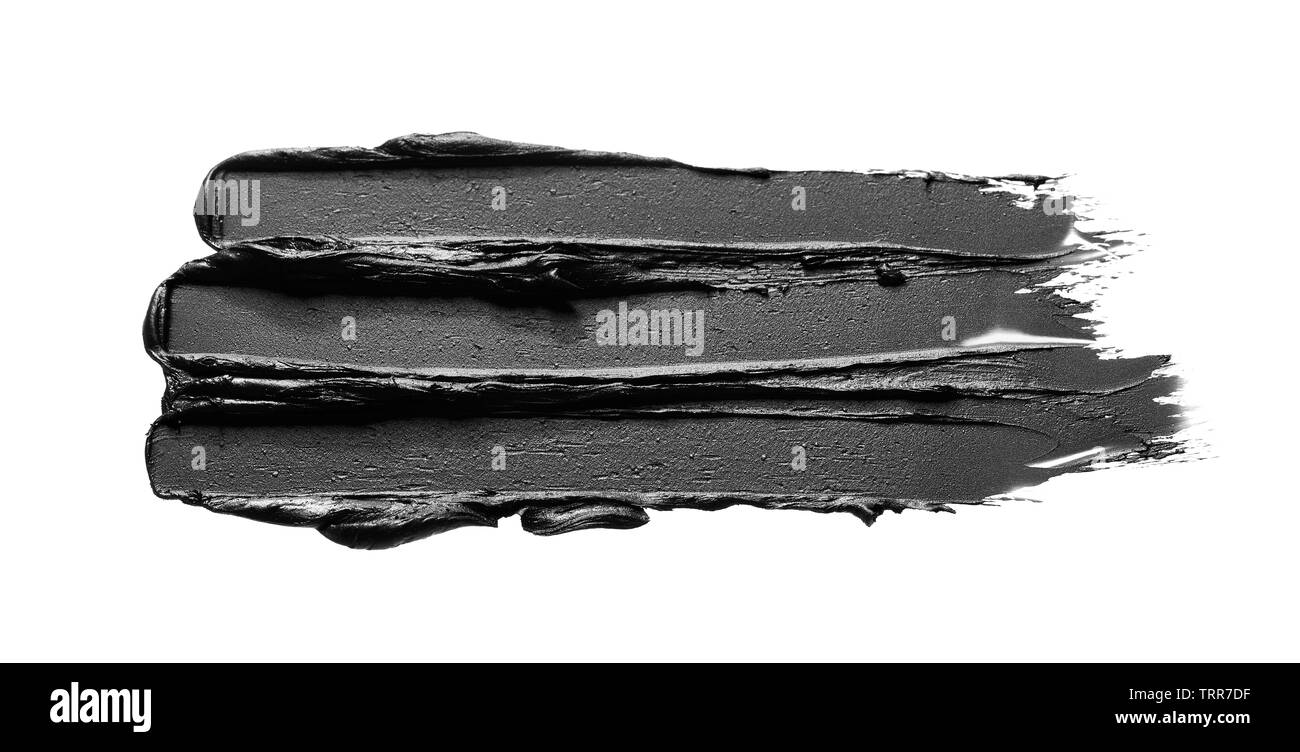 La texture di nero schiacciato eyeliner o vernice a base acrilica nera isolati su sfondo bianco Foto Stock