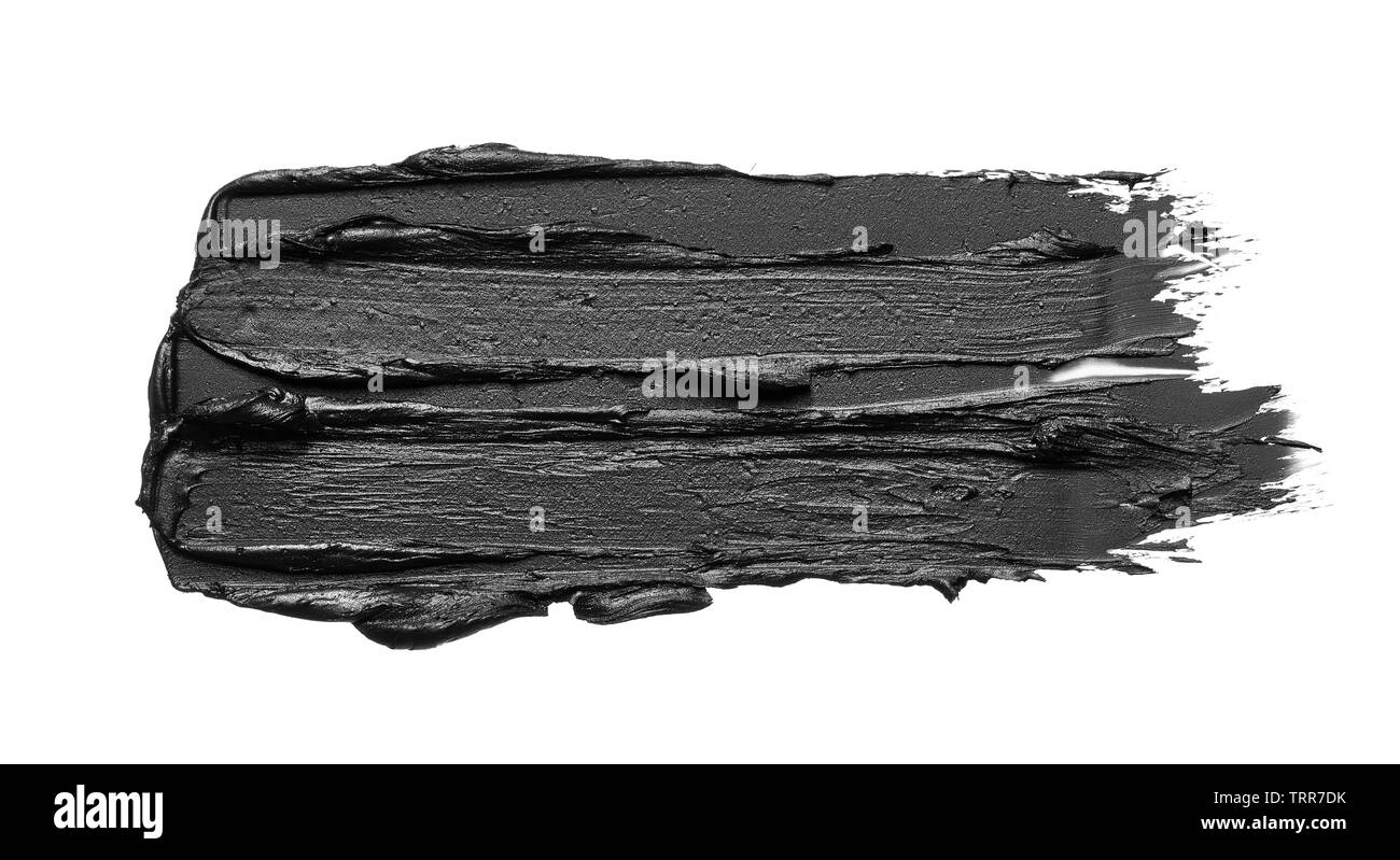 La texture di nero schiacciato eyeliner o vernice a base acrilica nera isolati su sfondo bianco Foto Stock