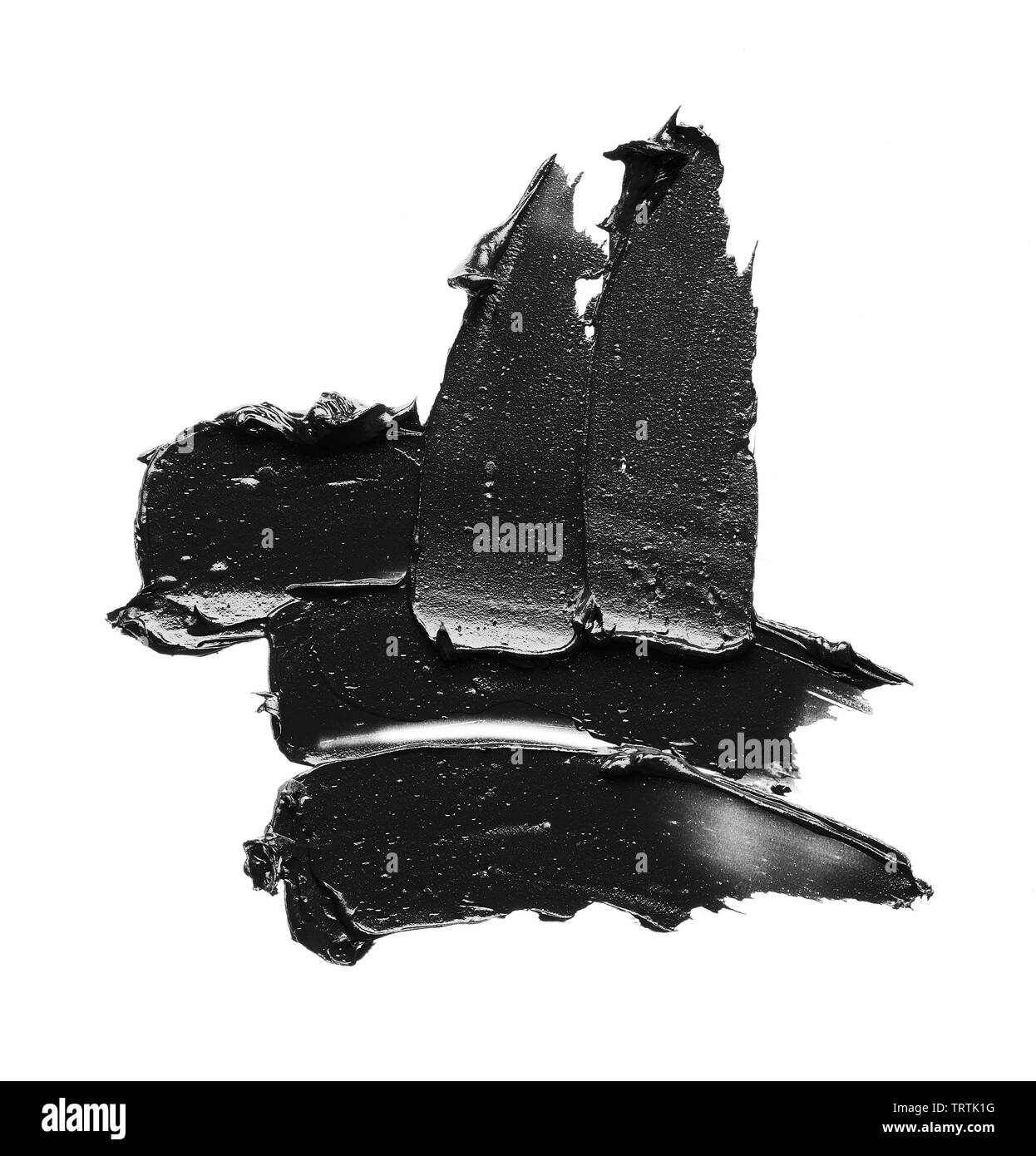 La texture di nero schiacciato eyeliner o vernice a base acrilica nera isolati su sfondo bianco Foto Stock