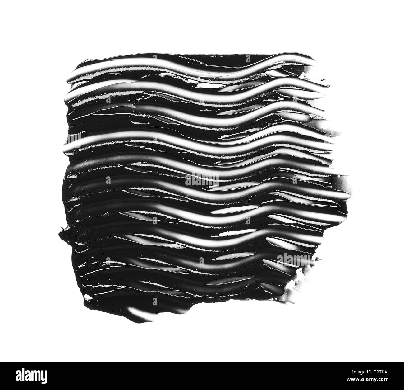 La texture di nero schiacciato eyeliner o vernice a base acrilica nera isolati su sfondo bianco Foto Stock