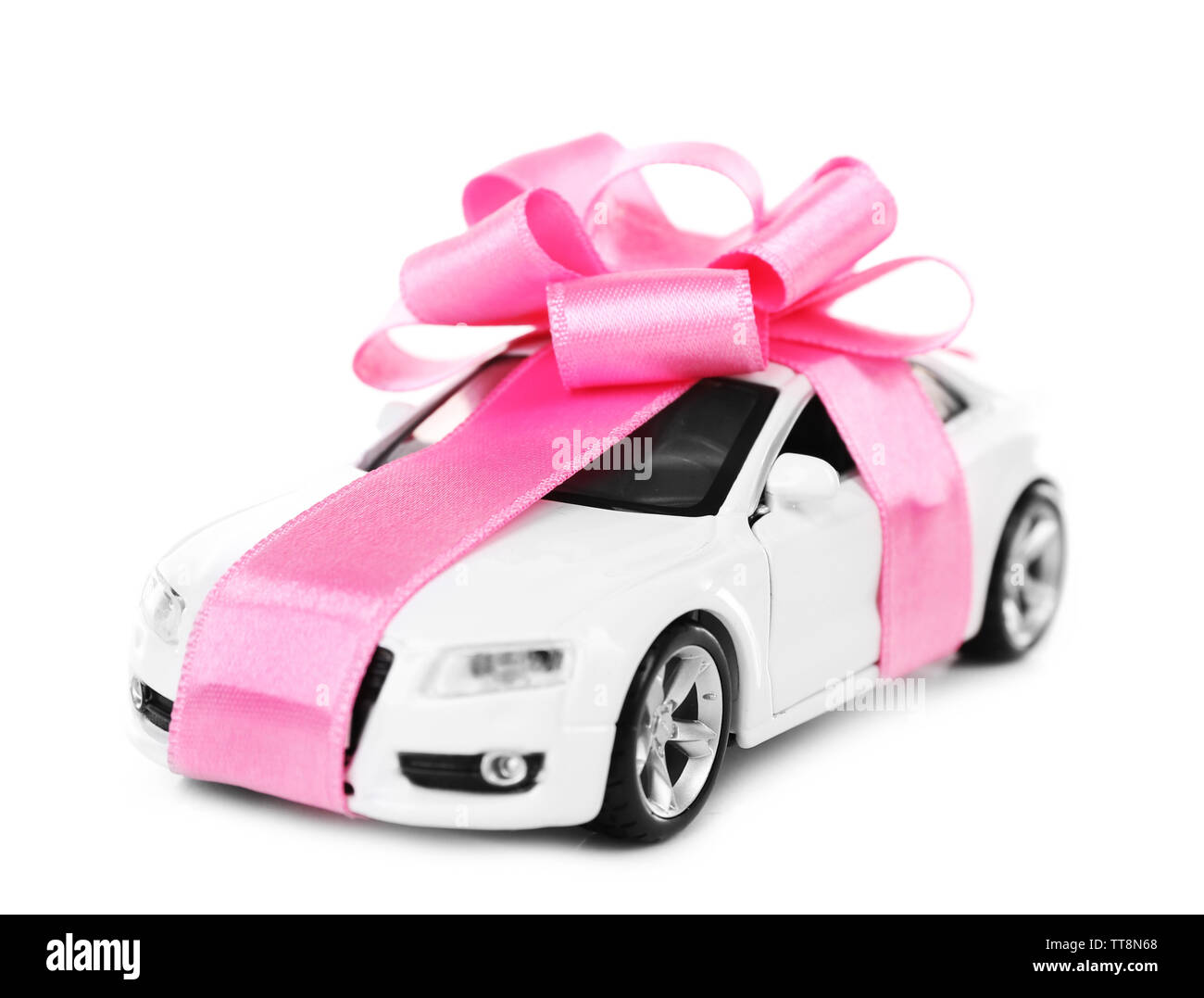 Nuova vettura con fiocco rosa come presente isolato su bianco Foto Stock
