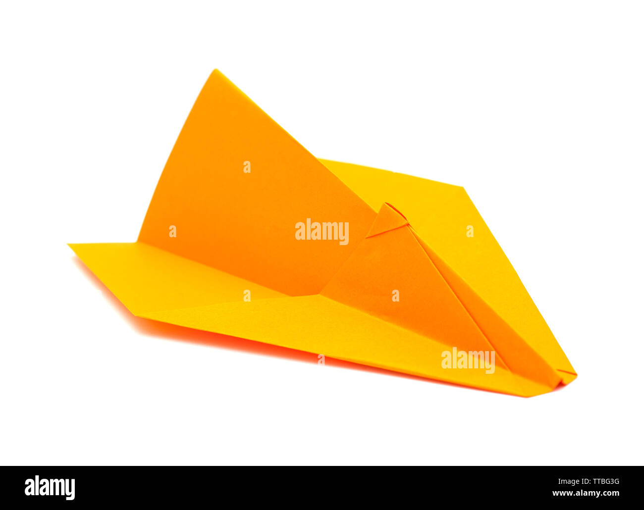 Aeroplano di carta fatta di carta a colori isolati su bianco Foto Stock