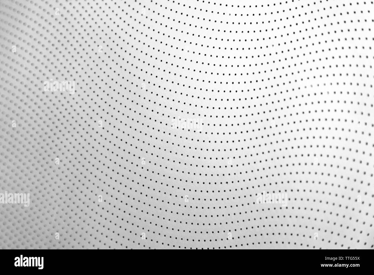 Close-up white traforato in cuoio sedile auto. La texture della pelle Foto Stock