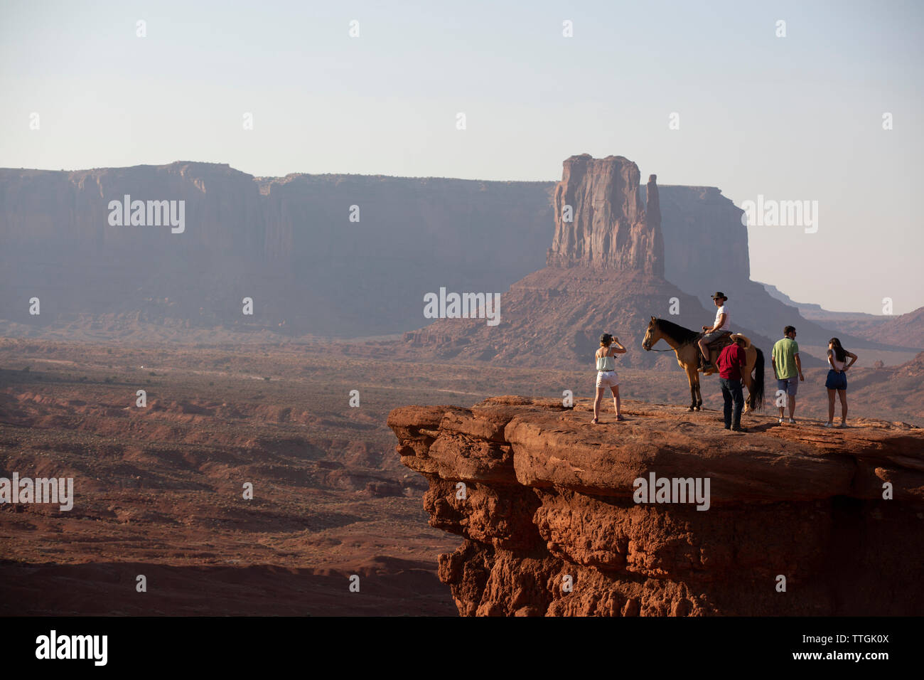 Fotografare persone se stessi con un cavallo nella Monument Valley Foto Stock