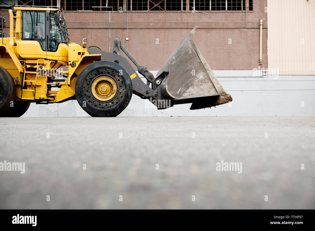 Scavatrice al di fuori dell impianto di riciclaggio Foto Stock