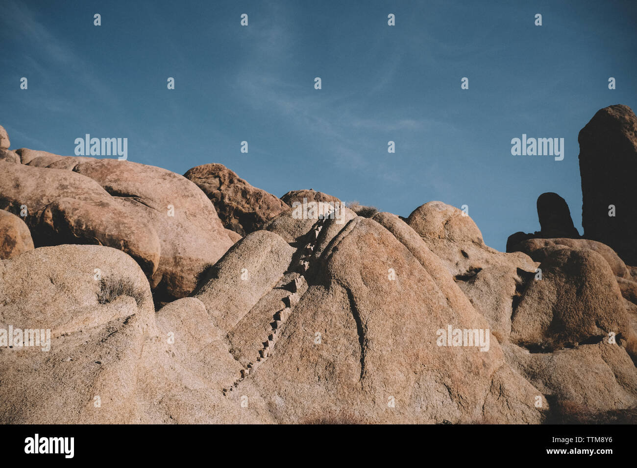 Visione idilliaca di formazioni rocciose contro sky presso il desert Foto Stock