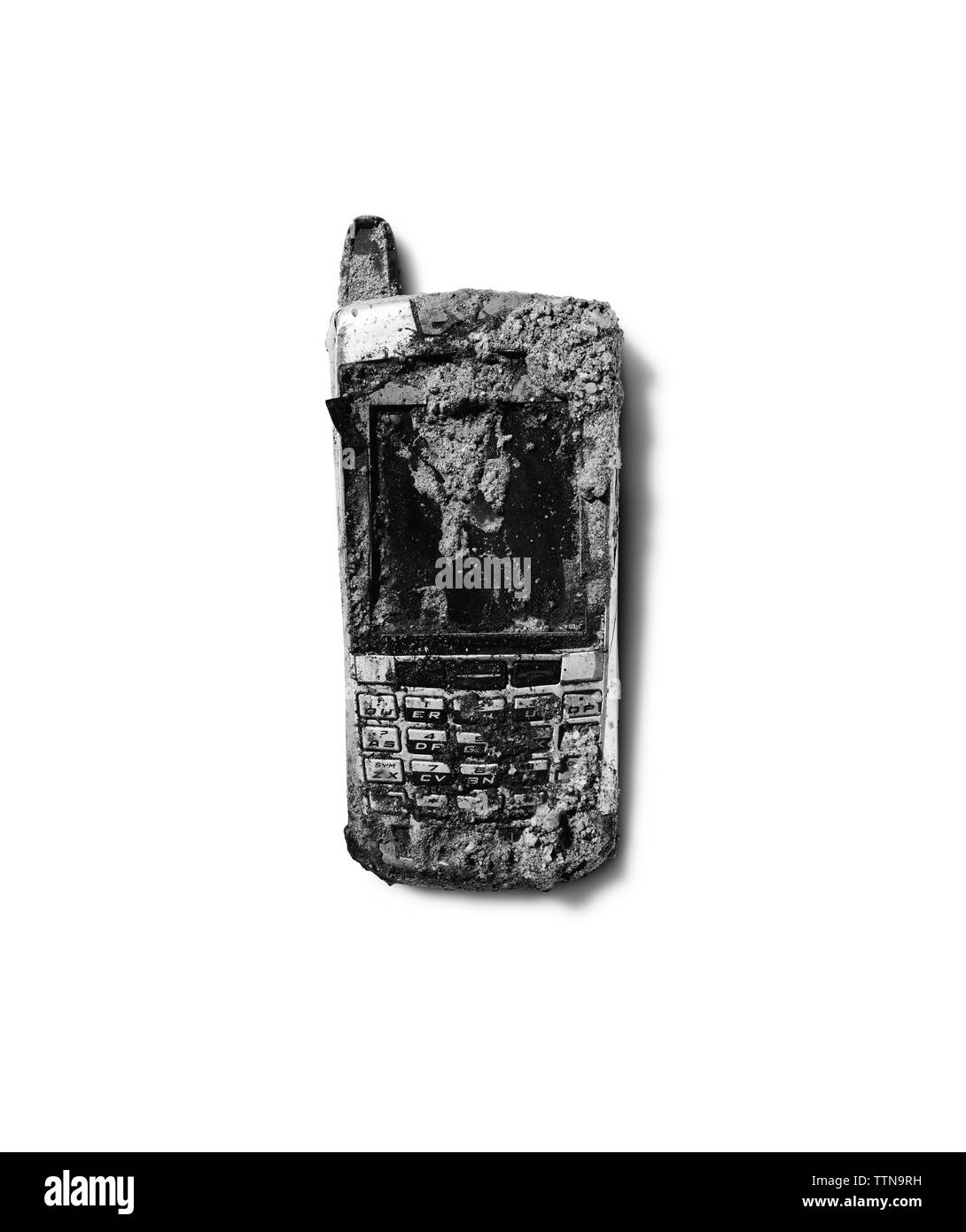 Il vecchio telefono cellulare su sfondo bianco Foto Stock