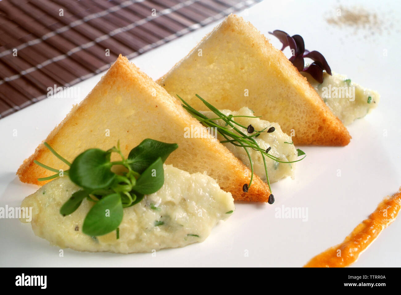 Ricette di cucina italiana brandade di stoccafisso con pane tostato Foto Stock