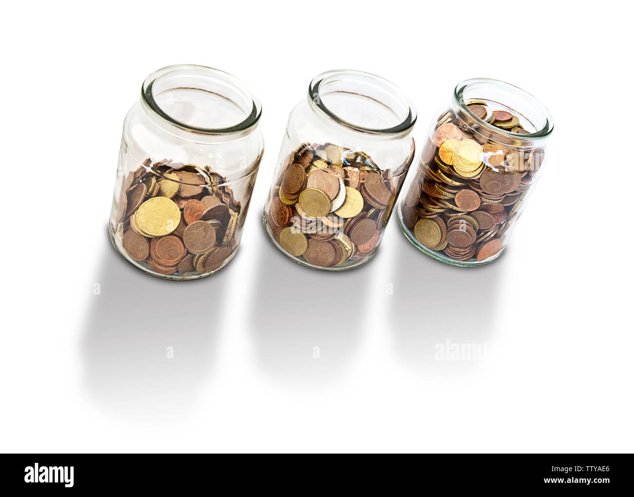 Tre vasi di vetro azienda monete Foto Stock