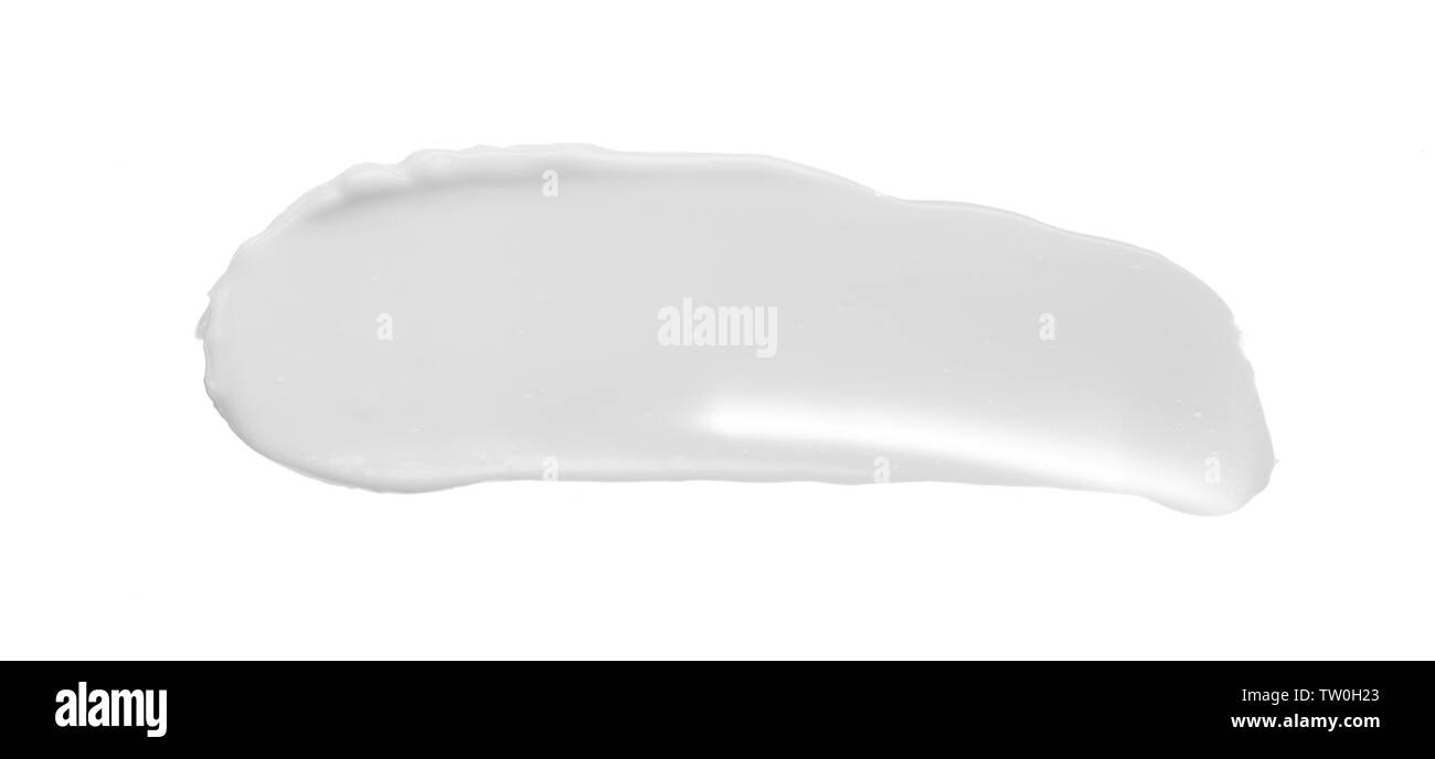 Macchie e consistenza di crema per il viso o bianco vernice acrilica isolati su sfondo bianco Foto Stock