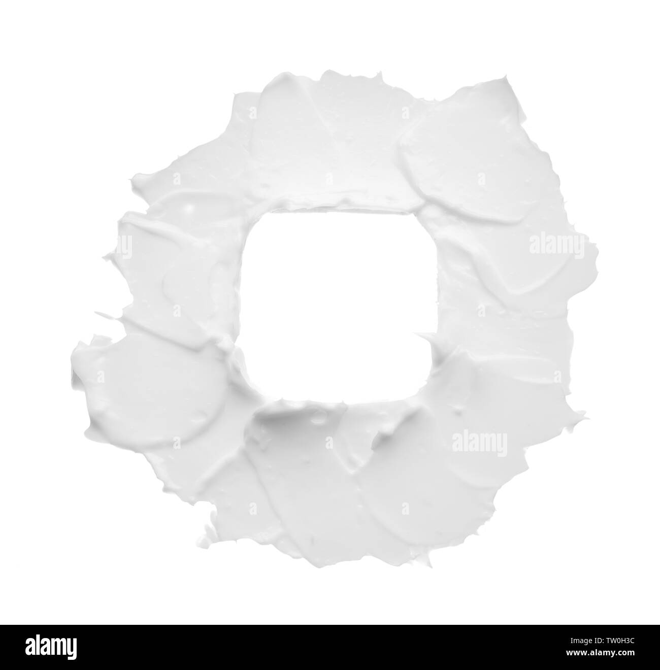 Macchie e consistenza di crema per il viso o bianco vernice acrilica isolati su sfondo bianco Foto Stock