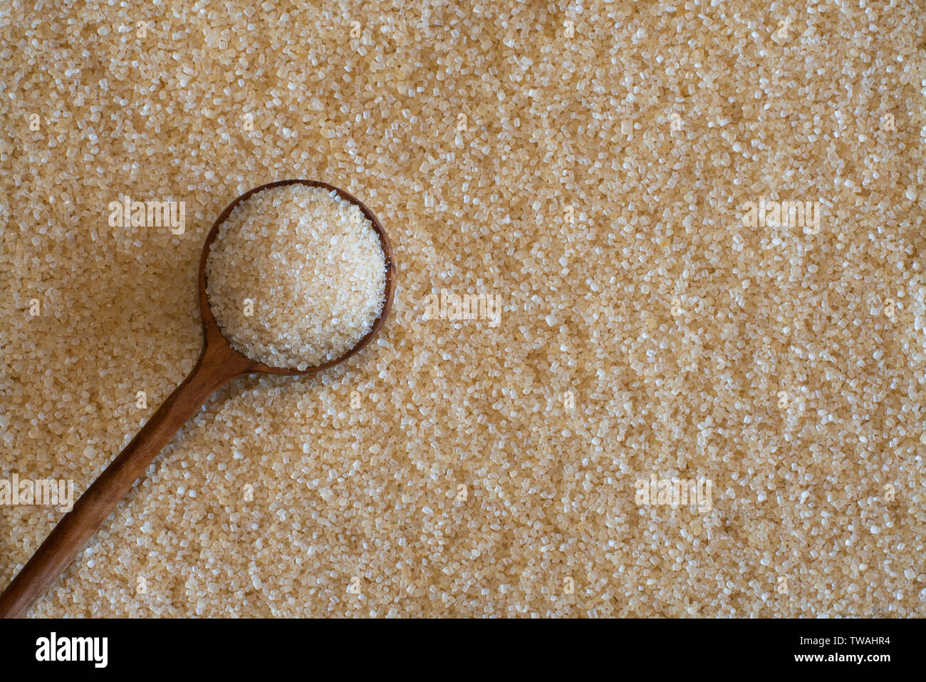 Lo zucchero di canna, considerato il mio molti di essere un alternativa più sana per lo zucchero bianco, ottiene è ricca di colore dorato da melasso. Foto Stock