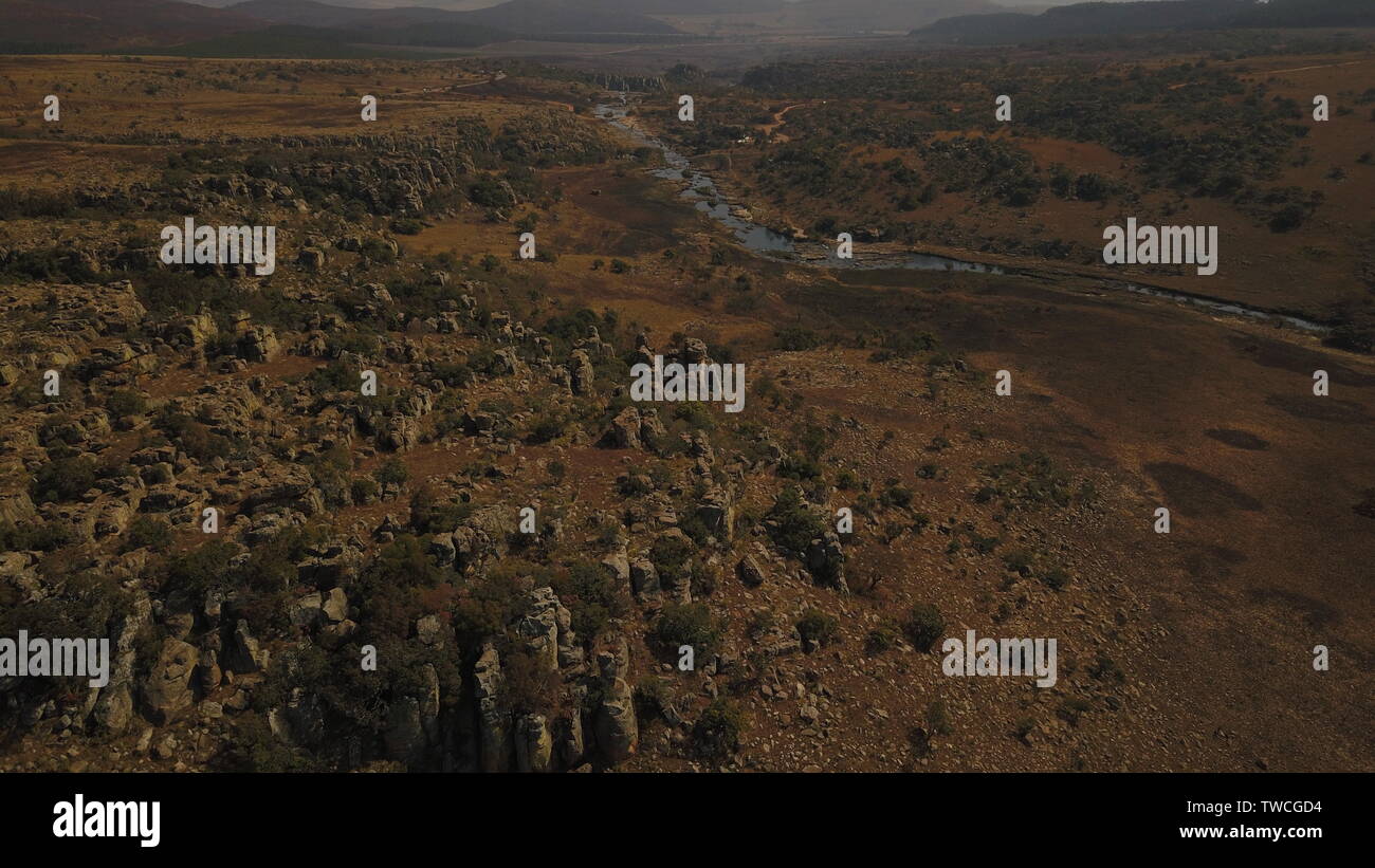 Buche in Sud Africa. In questi fori hanno trovato oro per una delle prime volte. Vicino al Parco di Kruger. Sud Africa. L'Africa. Foto Stock