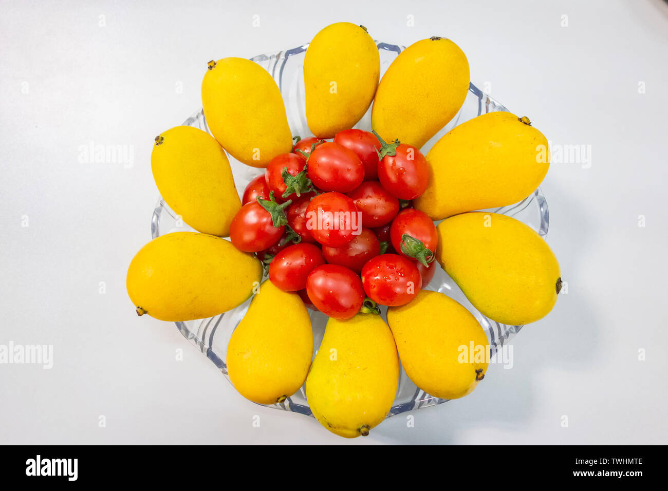 Mango e pomodorini Foto Stock