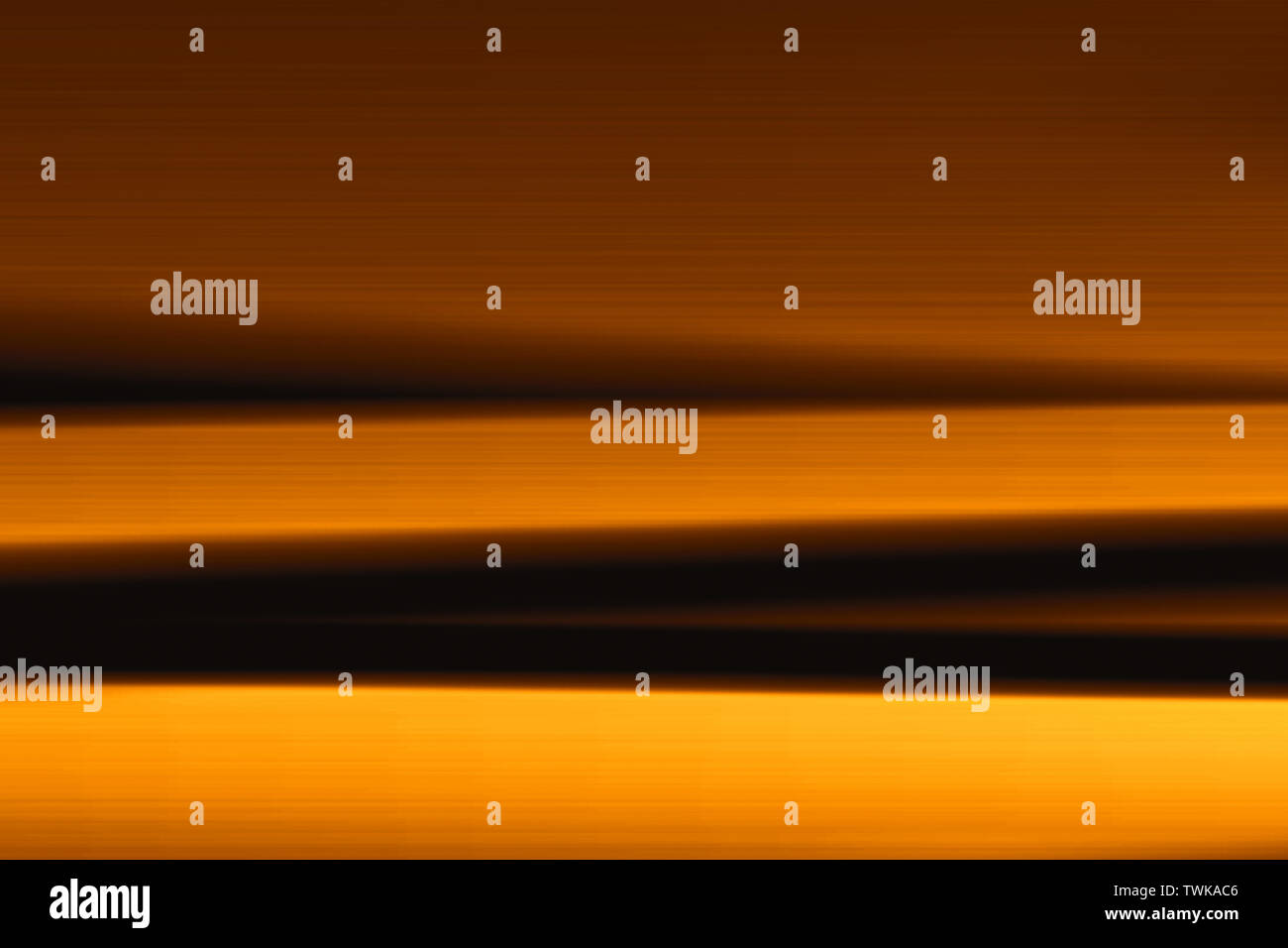 Abstract sfondo sfocato.Gold le linee e le curve. Configurazione a strisce. Foto Stock