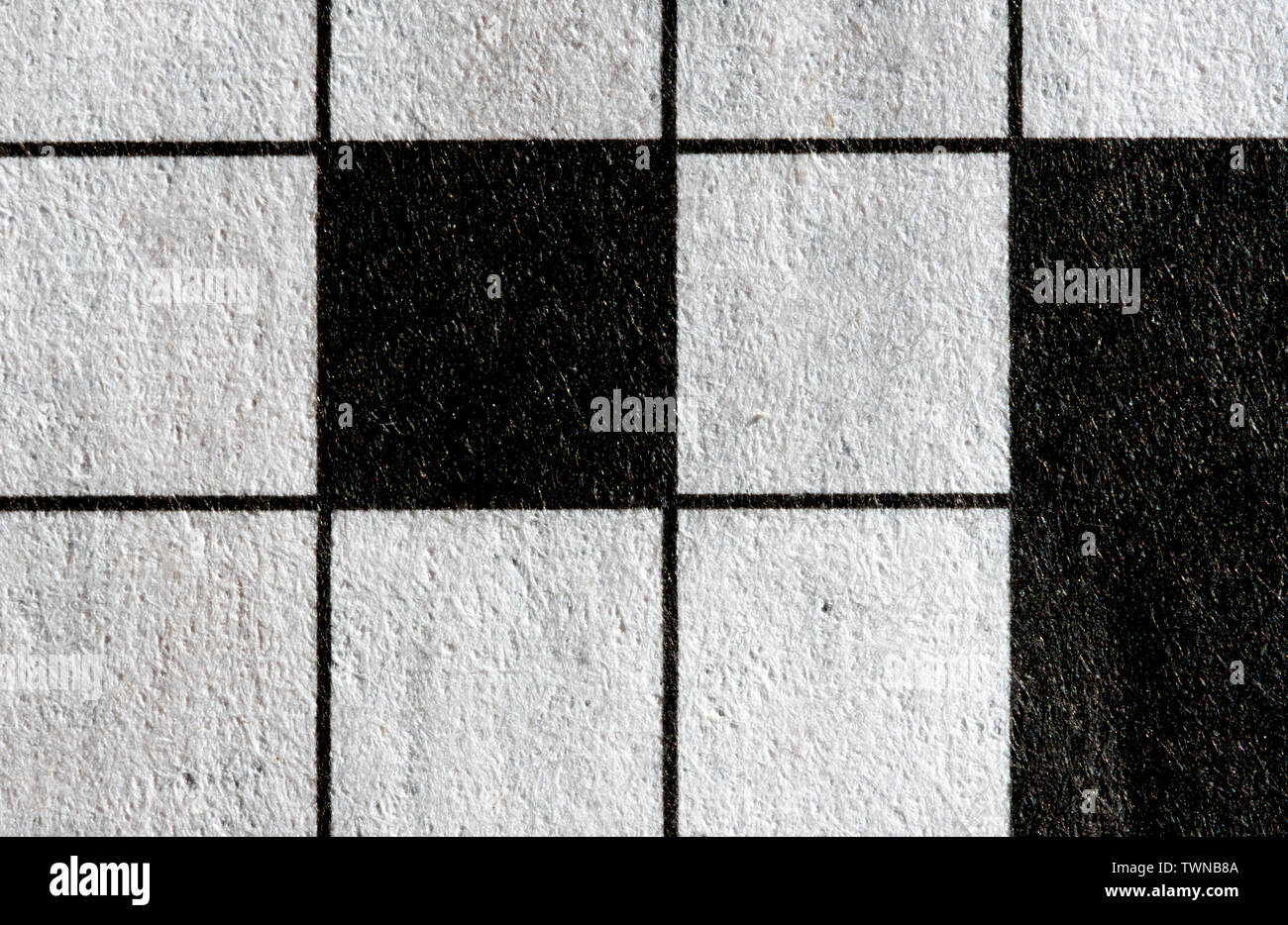 Macro Immagine del bianco e nero vuoto piazze cruciverba Foto Stock