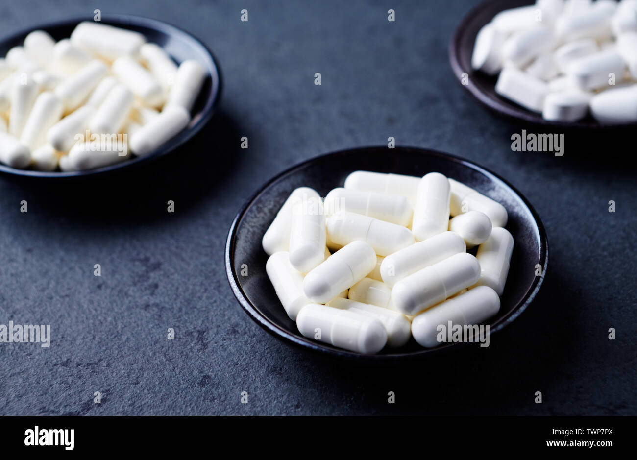 La creatina e arginina alfa-chetoglutarato (AAKG) capsule e compresse BCAA. Foto Stock