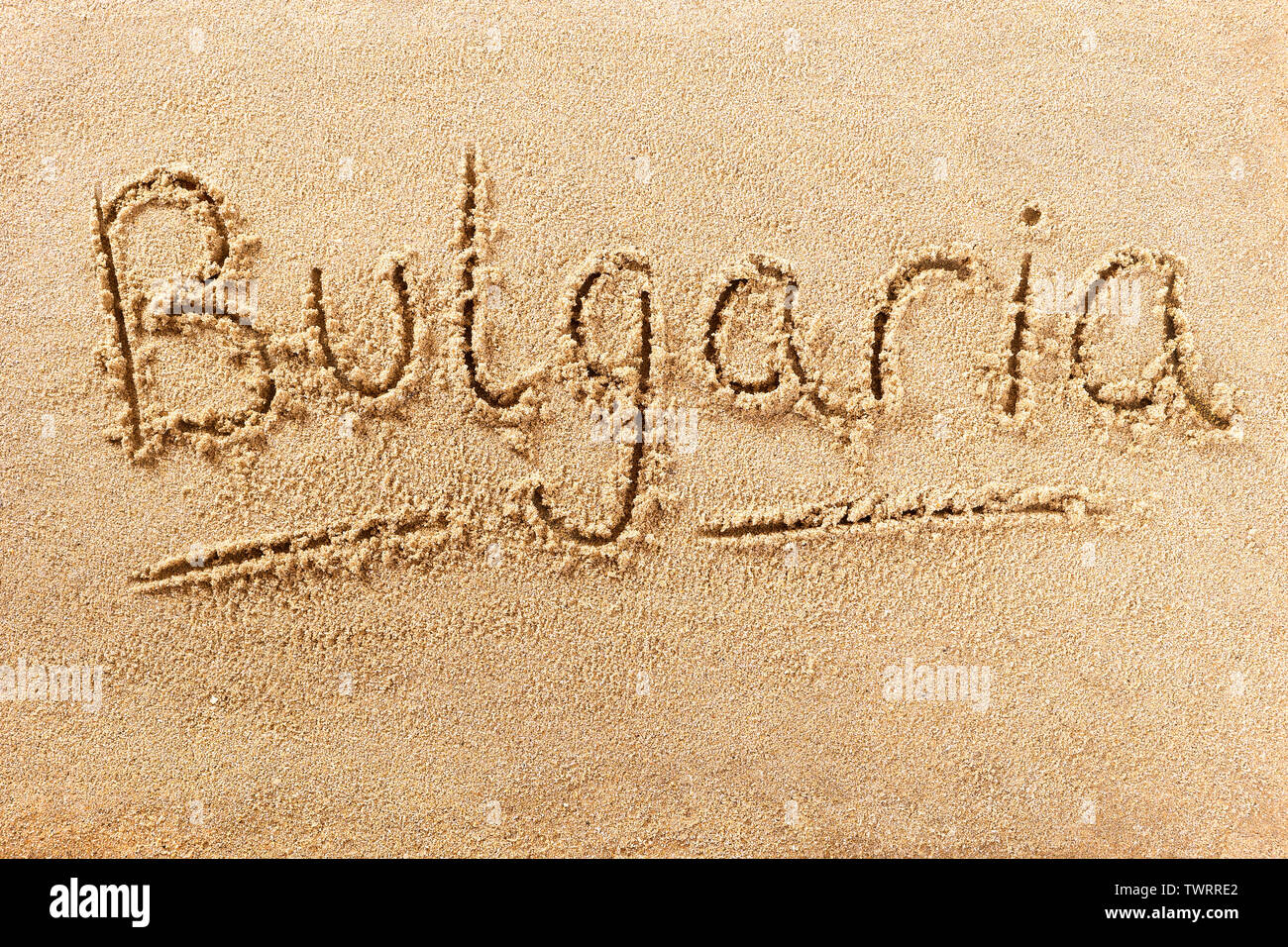 La Bulgaria spiaggia segno di parola scritta nella sabbia Foto Stock
