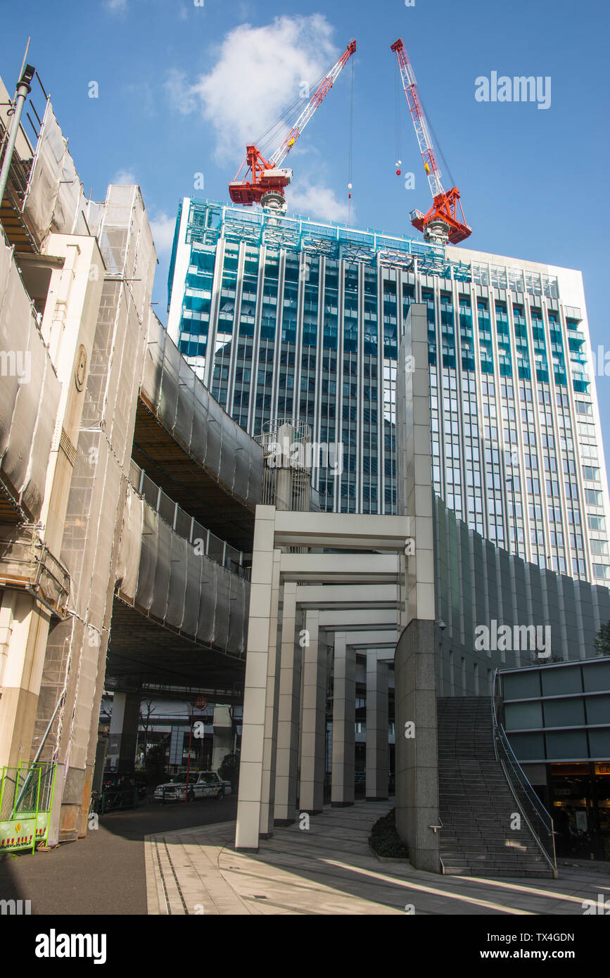 Giappone, Tokyo, Roppongi, sito in costruzione sulla sommità di un grattacielo Foto Stock