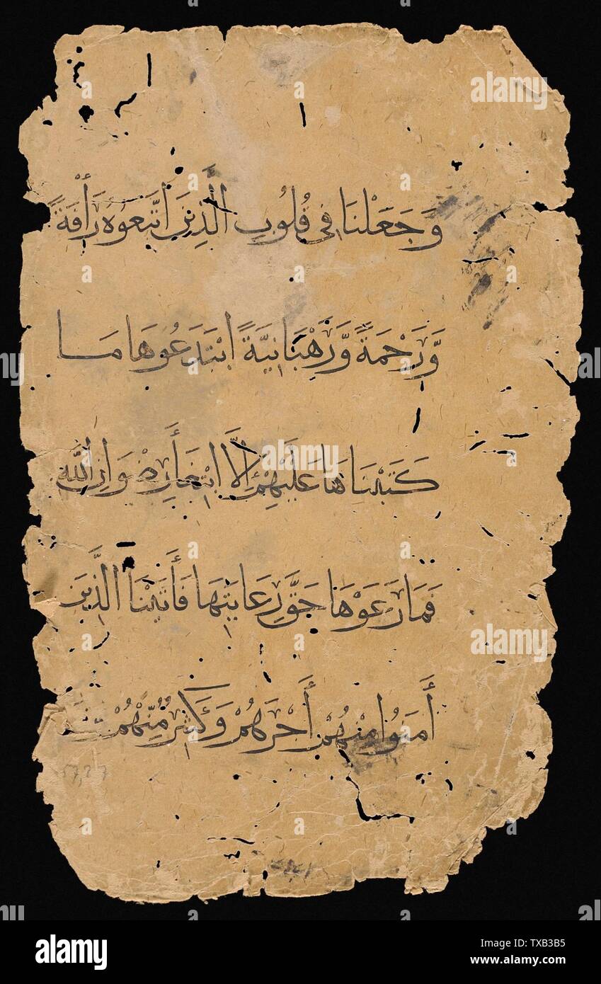 Pagina di un manoscritto del Corano (57:26-27) (immagine 1 di 2); Iraq, 14th secolo (periodo Jalayirid?) manoscritti inchiostro, colori e oro su carta Folio, totale: 12 x 7 15/16 in. (30,48 x 20,16 cm); testo bk: 8 x 5 3/8 in. (20,32 x 13,65 cm) Collezione Madina di Arte Islamica, dono di Camilla Chandler Frost (M.62.1.400) Arte Islamica; 14th secolo (periodo Jalayirid?); Foto Stock