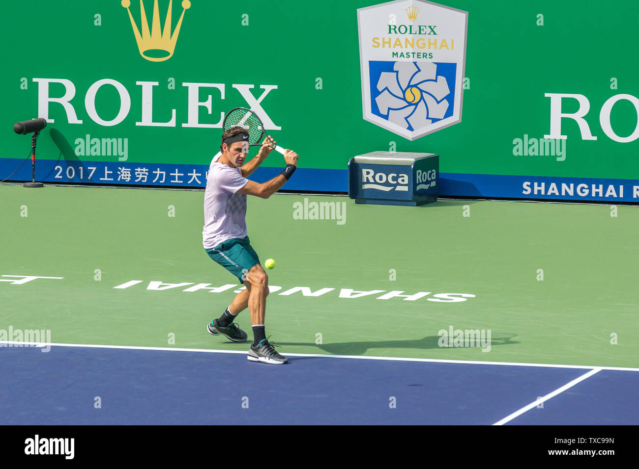 Federer è stato la pratica prima del gioco. Foto Stock