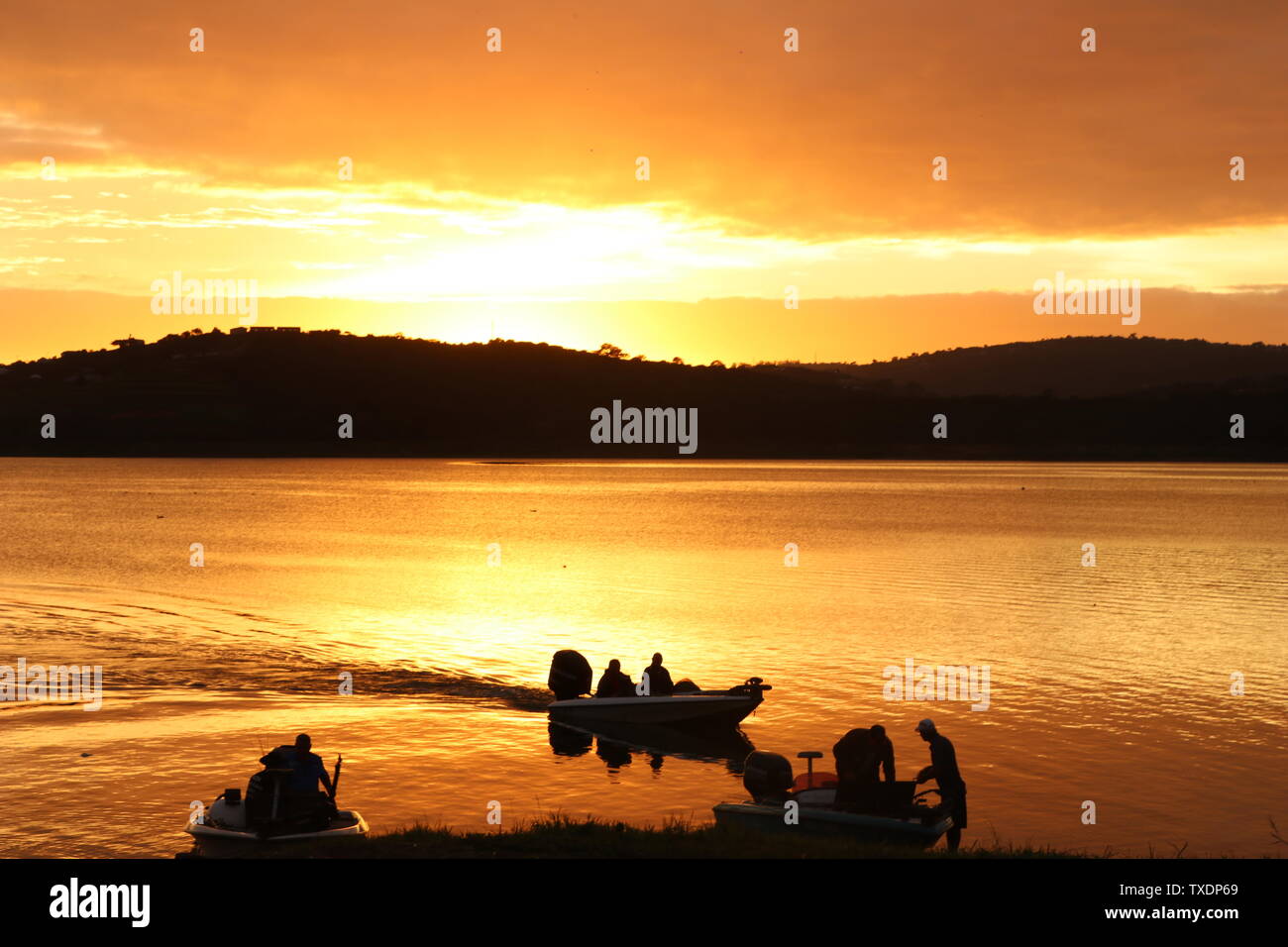 Bass pesca in Sud Africa su barche Foto Stock