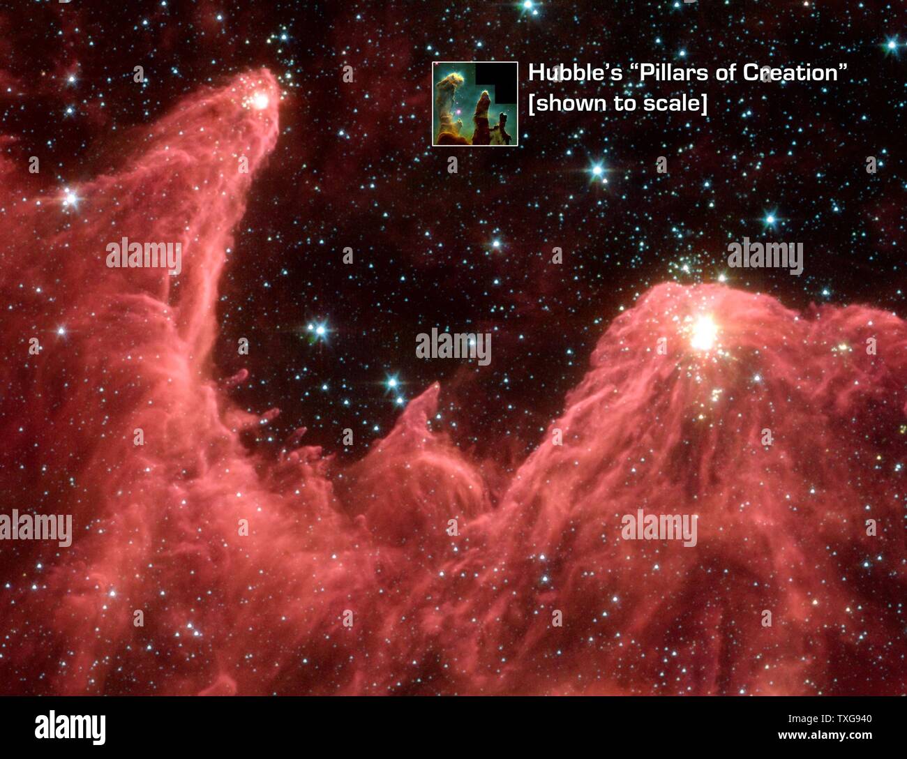 Telescopio spaziale Spitzer di falsa immagine a colori di 'mountains' dove nascono le stelle. 'Mountains della creazione', pilastri di raffreddare il gas e polvere sono illuminati in corrispondenza delle punte con luce da embrione stelle Credit NASA Foto Stock