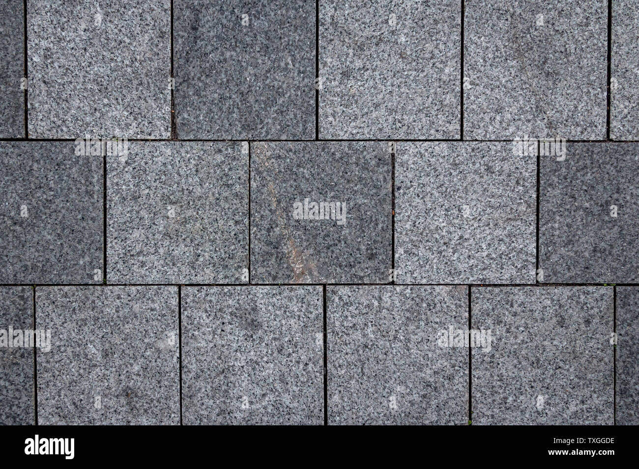 Piastrelle di calcestruzzo texture. Città sullo sfondo della pavimentazione. Pietra astratta brick pattern. Street sidewalk texture. Foto Stock